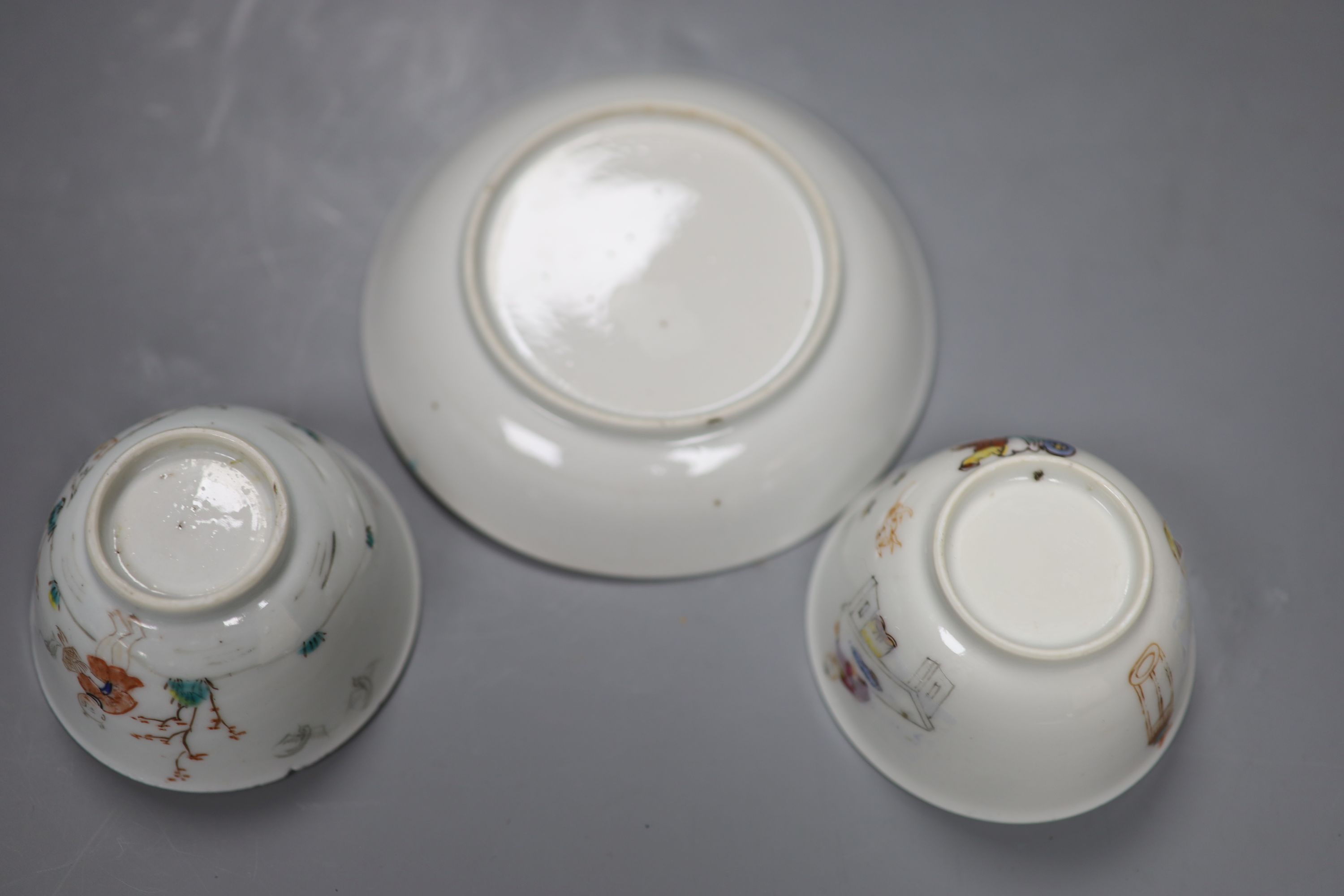 An 18th century Chinese tea bowl and saucer, and a similar tea bowl, height 4cm